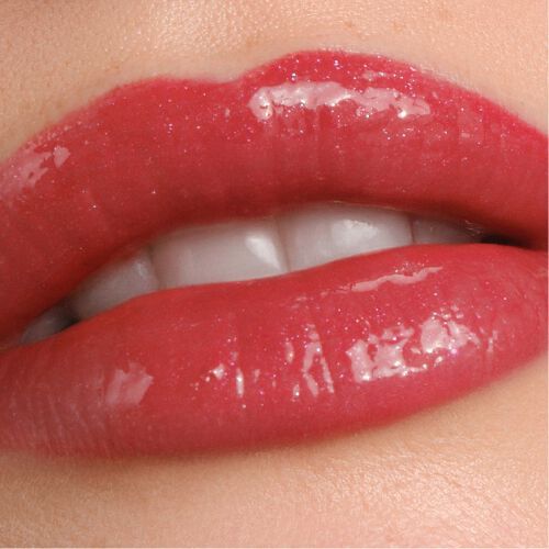 Armani Prisma Flash 42 Crimson Flash lipstick on lips, presenting a rich crimson red with a glass-like shine.