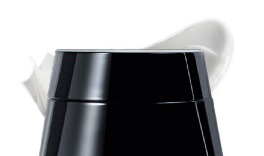 A black jar with a white cream or product partially visible at the top.