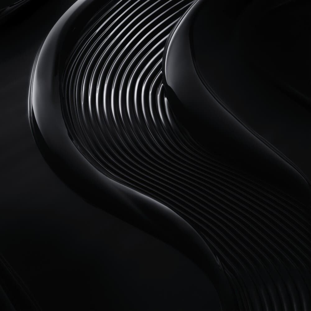 Abstract black curves and ridges create a smooth, flowing texture against a dark backdrop, emphasizing depth and form.