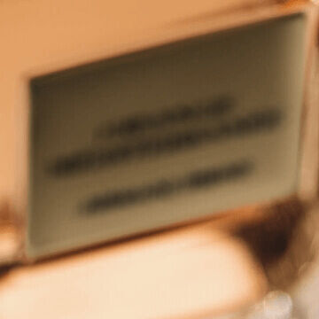 Video showcasing ingredients, cinematic silhouette and bottle of Armani/Prive Orange Mediterranee fragrance.
