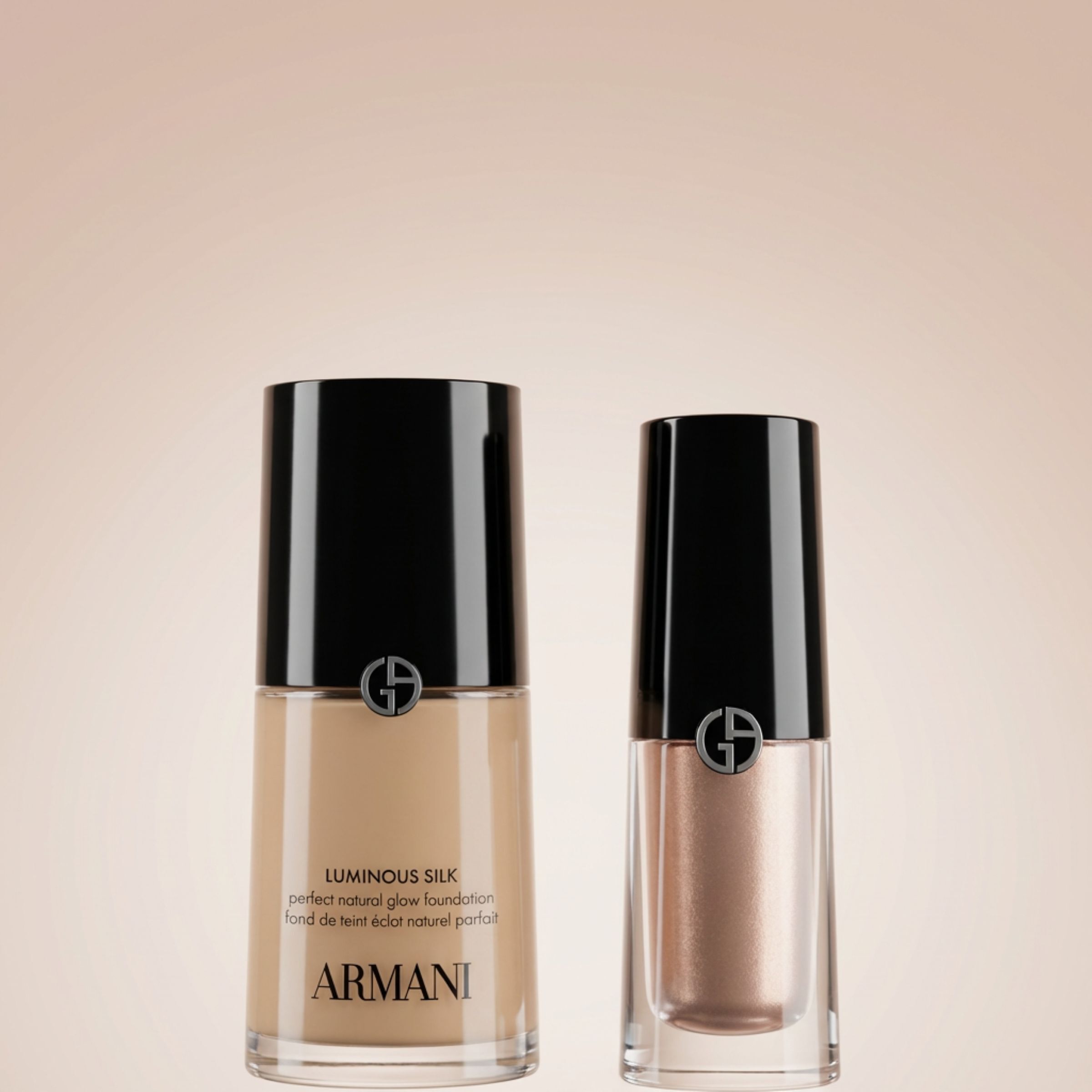 An elegant pairing of Armani icons: the Luminous Silk Foundation and a radiant Eye Tint. Standing against a soft glow, they represent the effortless beauty and weightless radiance that define the House’s signature complexion and gaze.​