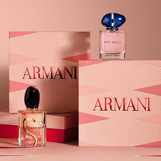 Giorgio Armani Si and My Way fragrance bottles displayed with pink branded gift boxes.