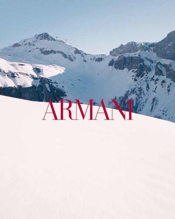 Snow-covered Italian Alps setting for the Armani beauty Holiday 2026 winter glamour campaign. 