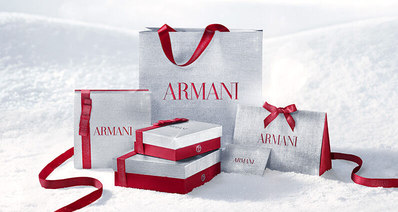 Giorgio Armani "Si" and "My Way" perfume bottles displayed with decorative Armani gift boxes.